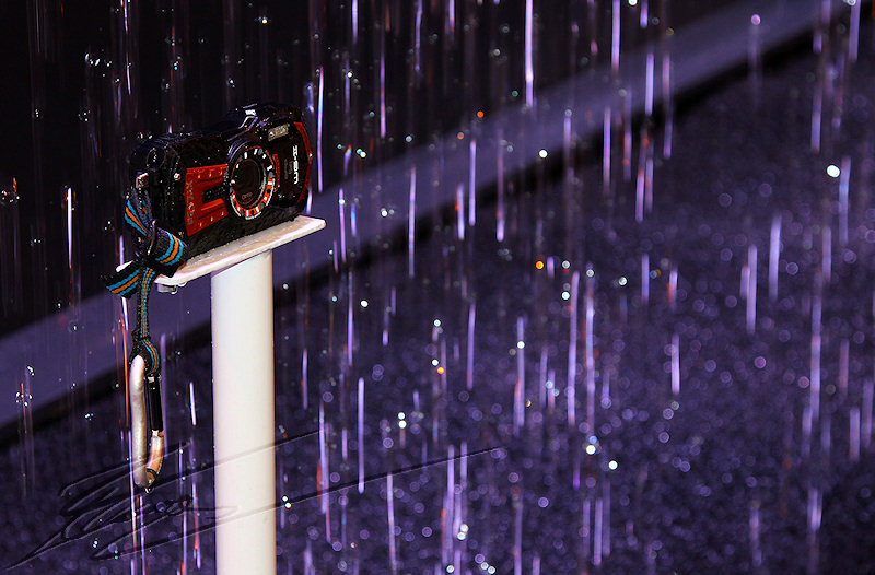 reportage 2012 france paris salon de la photo hall expo exposant stand pentax douche pluie eau waterproof résistant à l'eau étanche optio